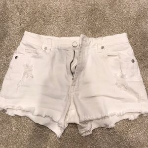 White distressed denim shorts